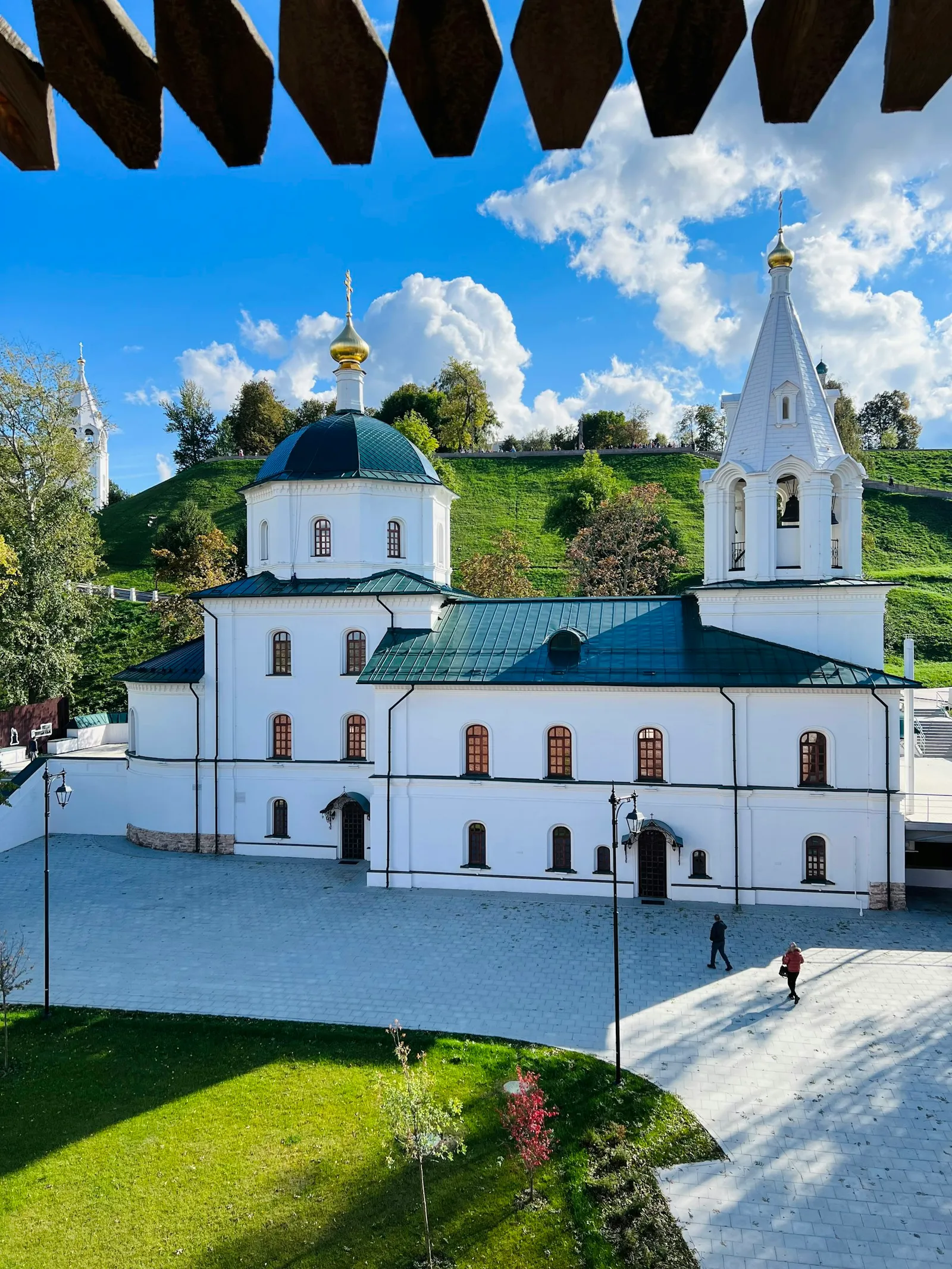 White building with a blue roof